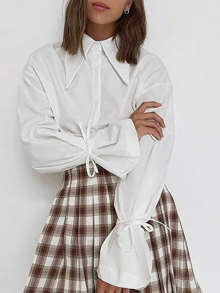 Camisa folgada manga sino