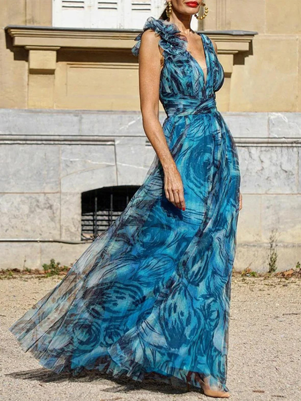 Vestido largo sin mangas con estampado de vuelo