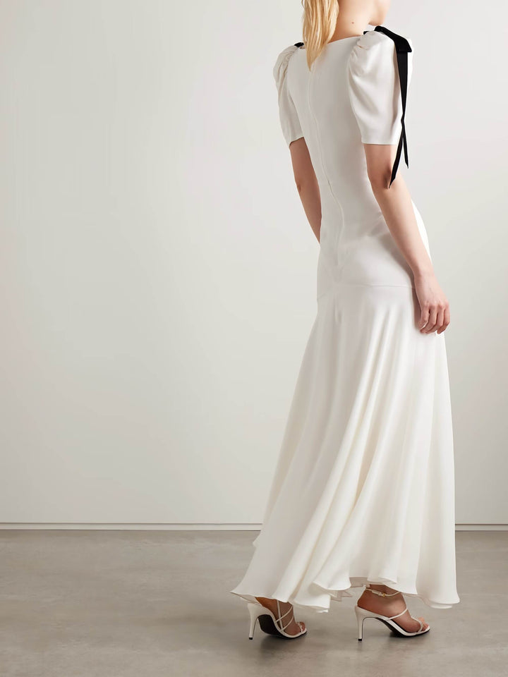 Velvet bow embellished white gown