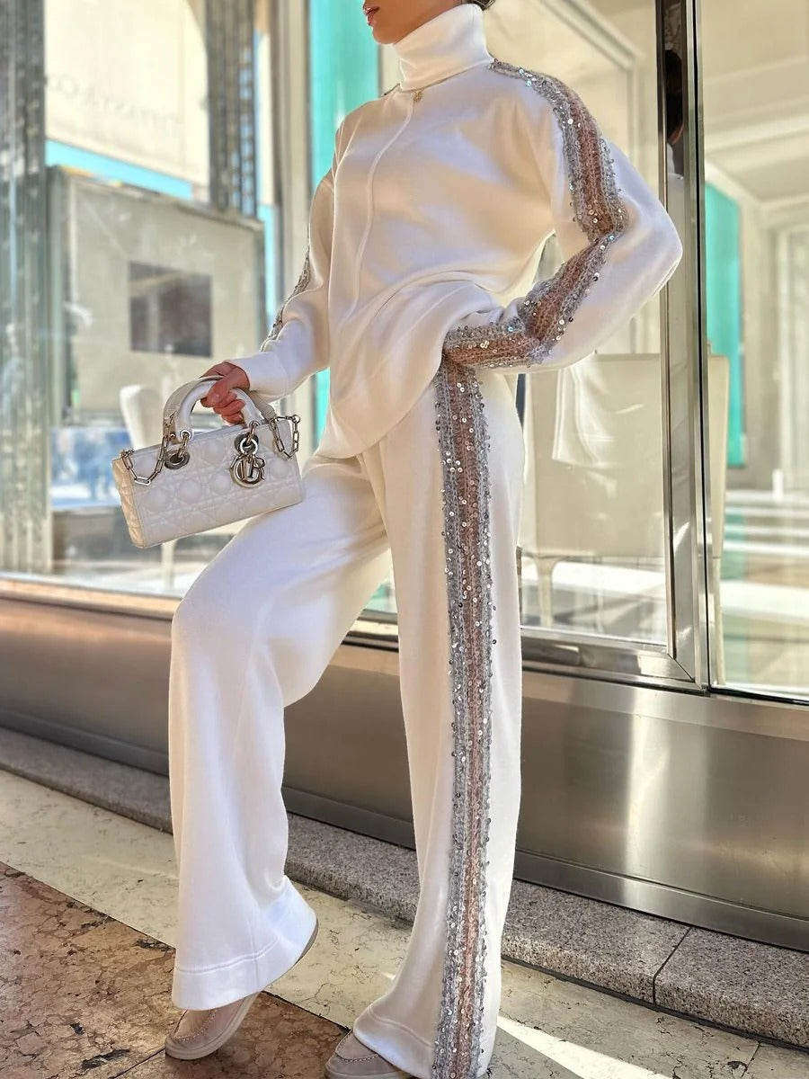 Conjunto de pantalones con lentejuelas y cuello alto