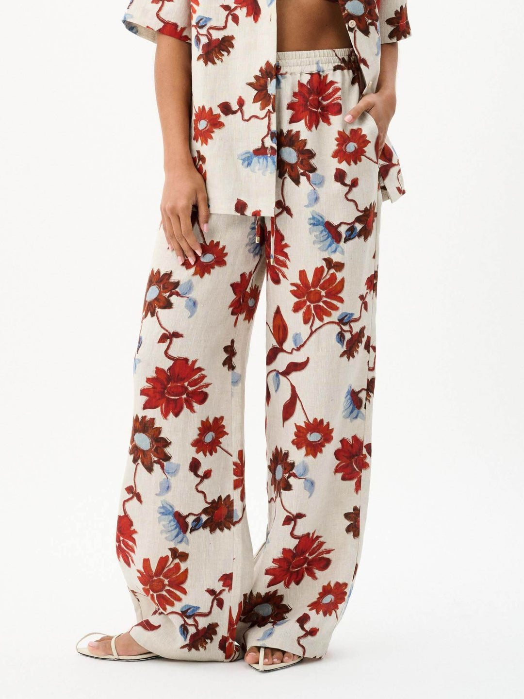 Pantalon large à lacets et imprimé floral exquis