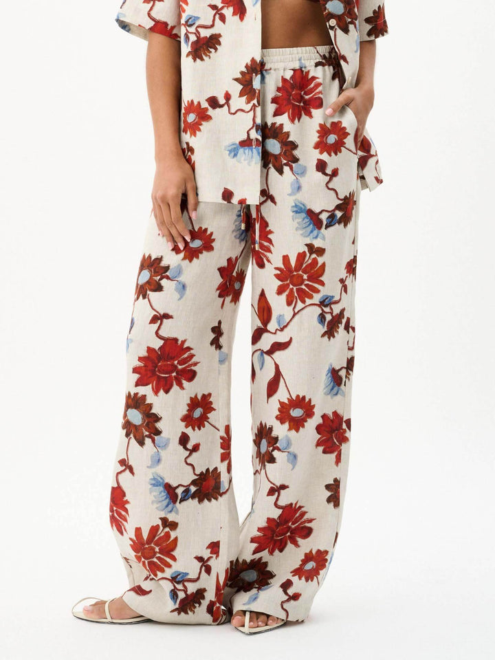 Pantalon large à lacets et imprimé floral exquis