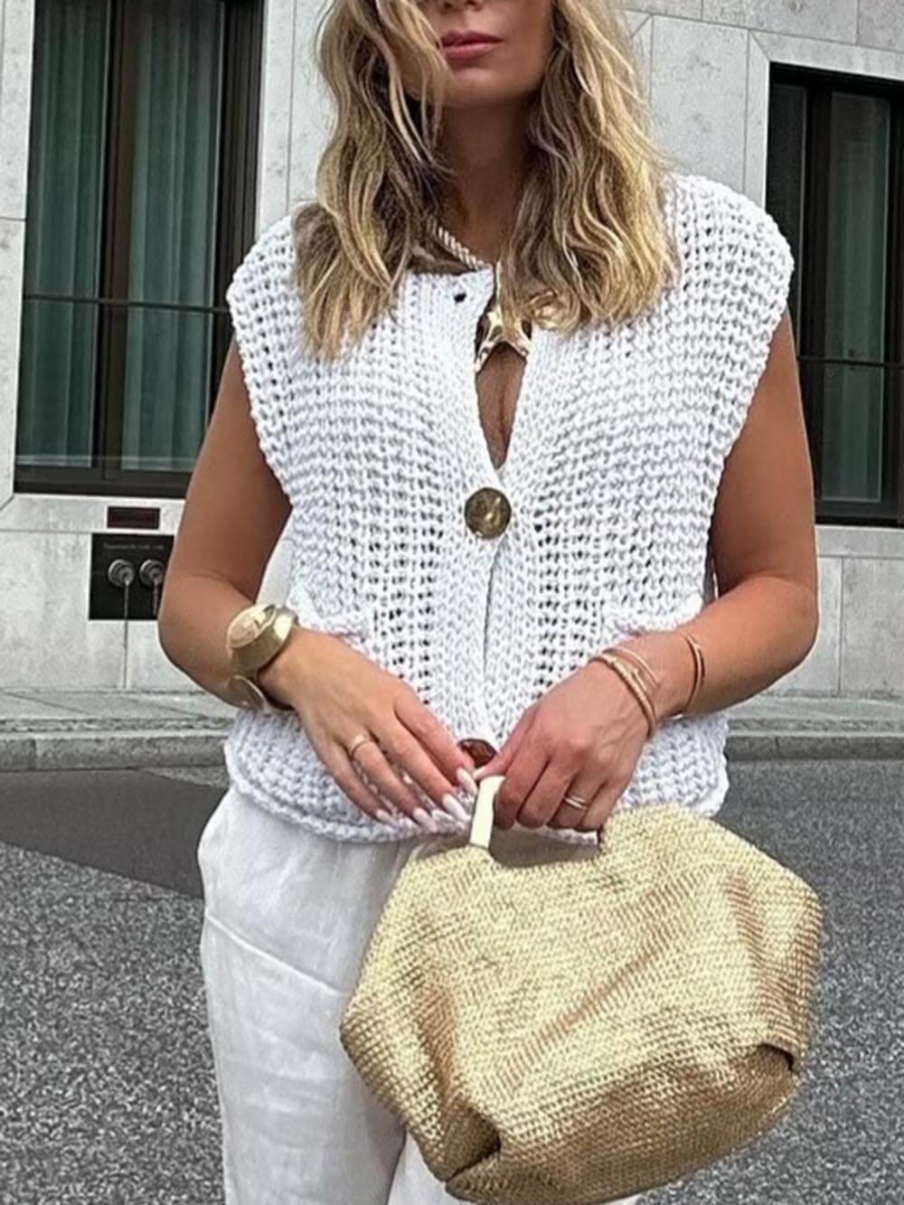 Elegante cardigan in maglia corta senza maniche con tasca