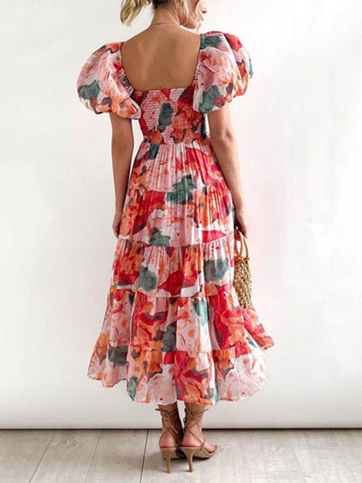 Robe mi-longue évasée à imprimé floral, coupe étagée, smockée