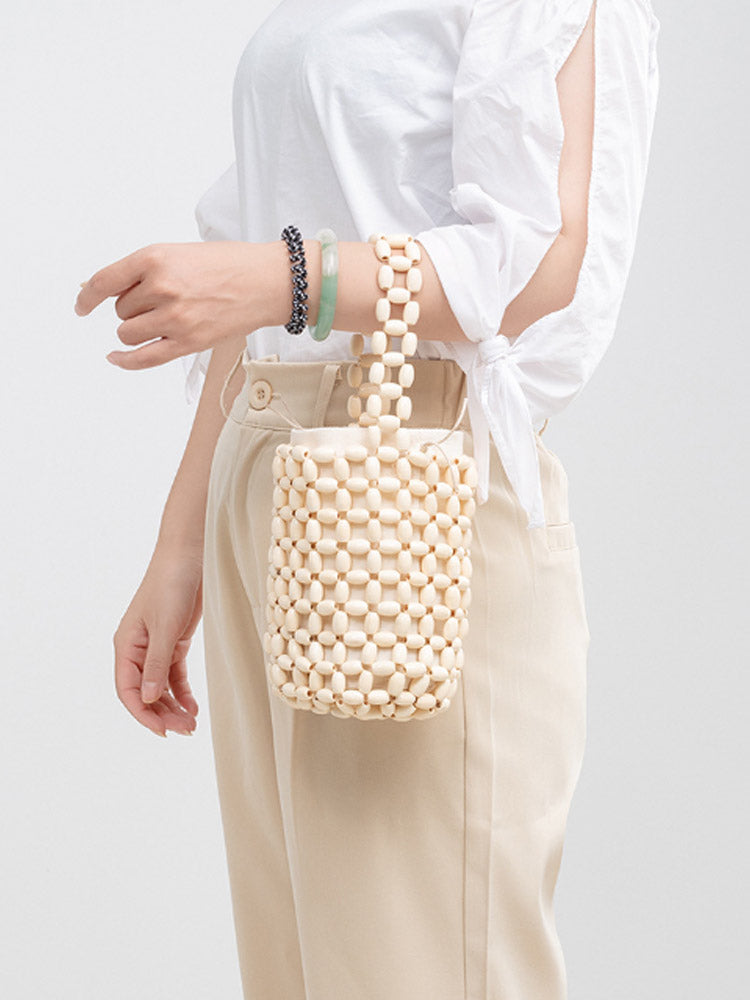 Hëlzent-Out Holz Bead Woven Bucket Bag