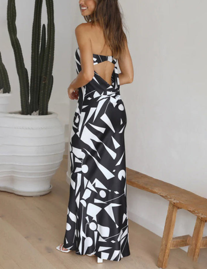 Off-shoulder maxi-jurk van satijn met geometrische print