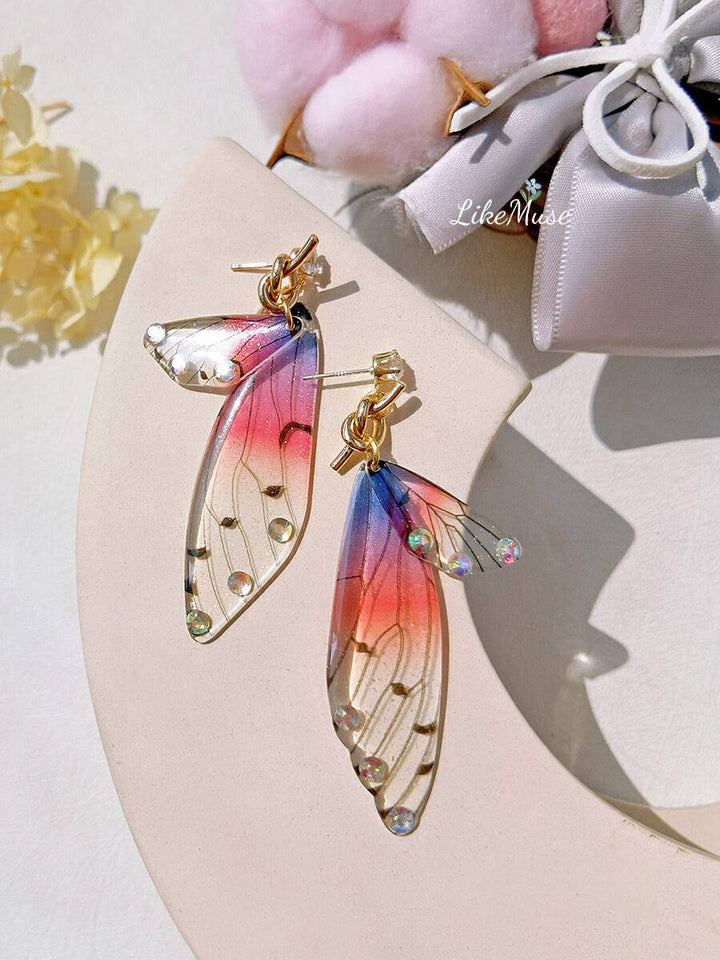 蝶の羽の非対称イヤリング クリスタル ダイヤモンド イヤリング