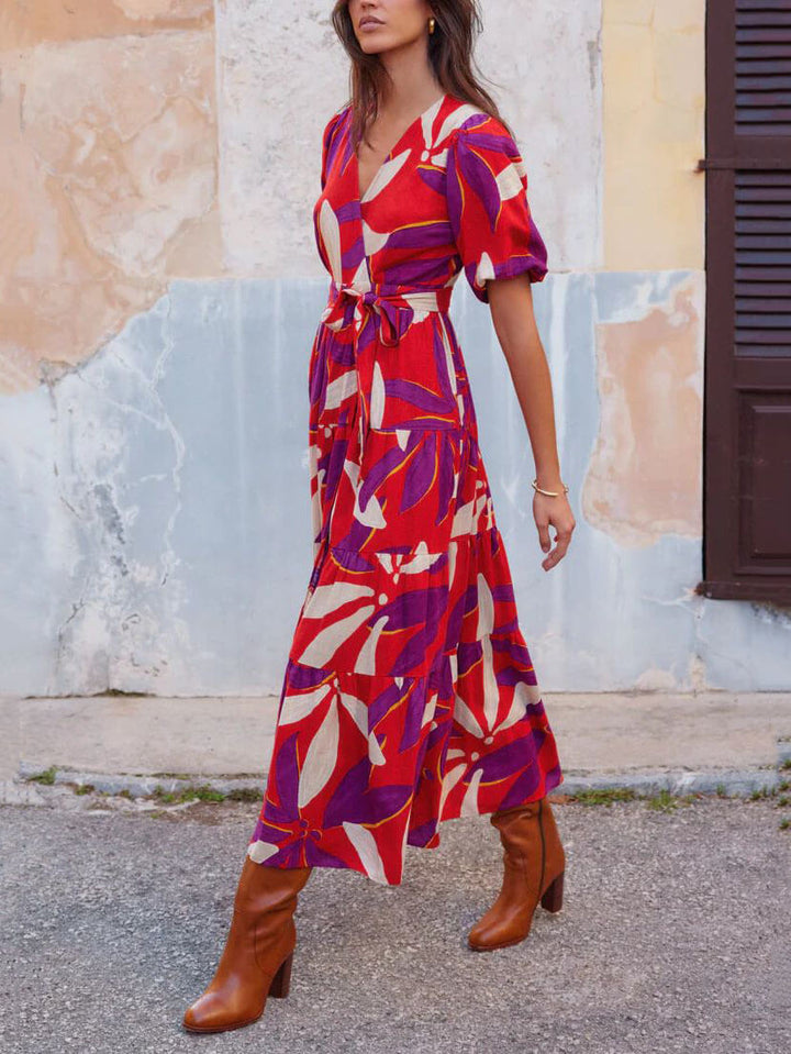 Vestido largo estampado con abertura y mangas abullonadas con cuello en V