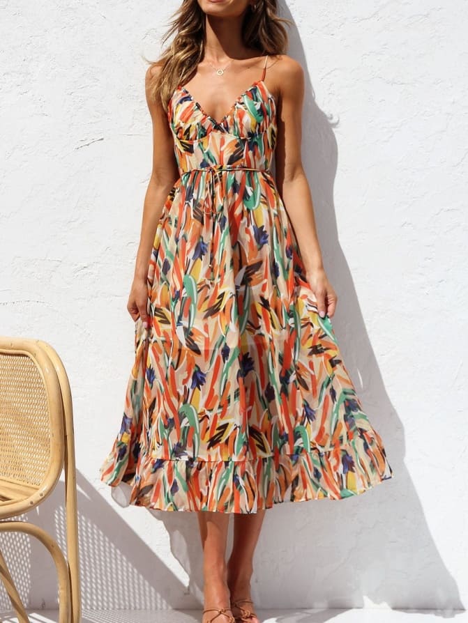 Vestido midi sin mangas con ribete floral y volantes