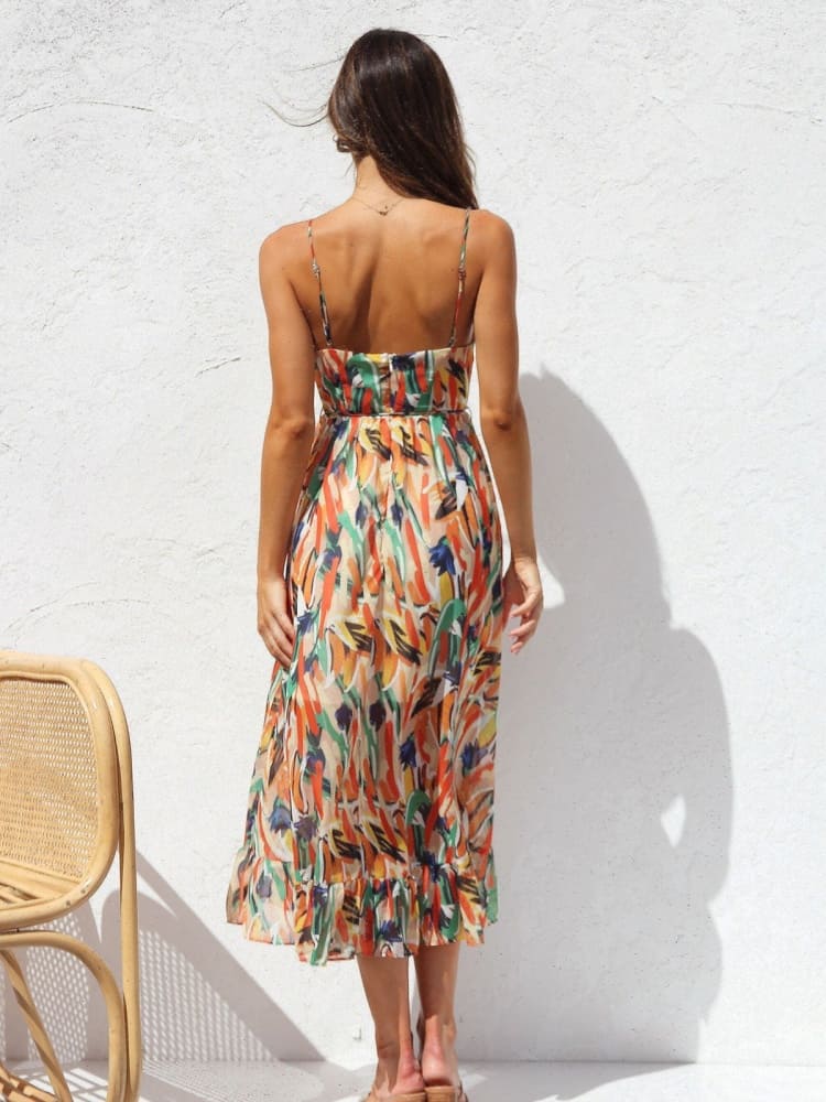 Vestido midi sin mangas con ribete floral y volantes