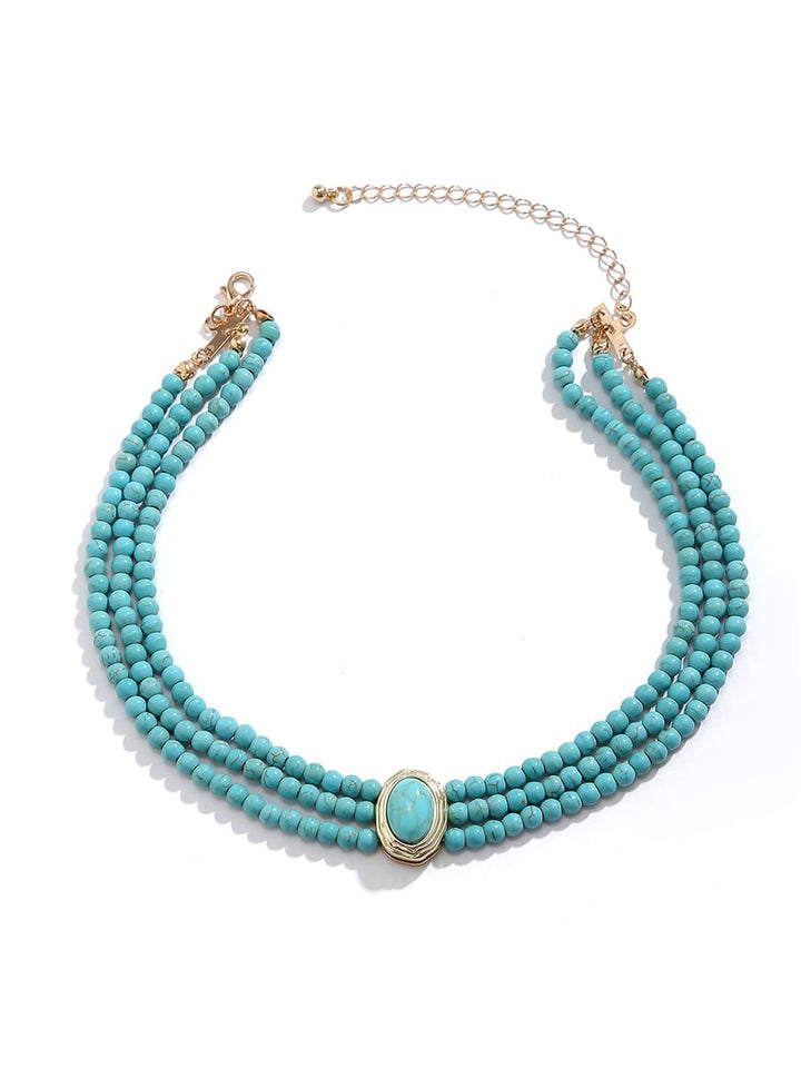 Collier court en fausses perles et perles turquoise