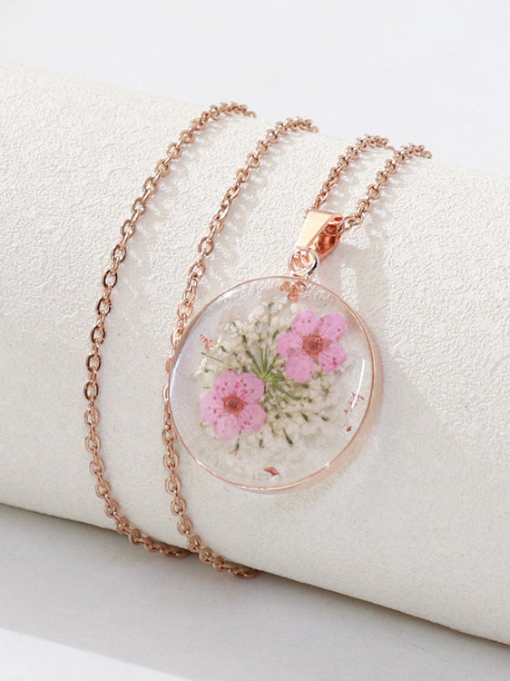 Collana con ciondolo fiore del nontiscordardime essiccato