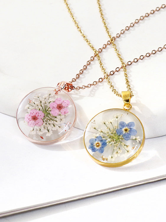 Collana con ciondolo fiore del nontiscordardime essiccato