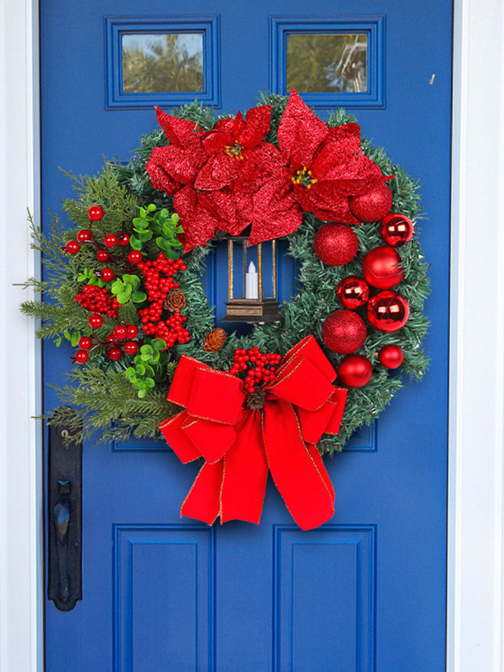 Decorazione della porta d'ingresso della casa con lampada a olio con ghirlanda di Natale