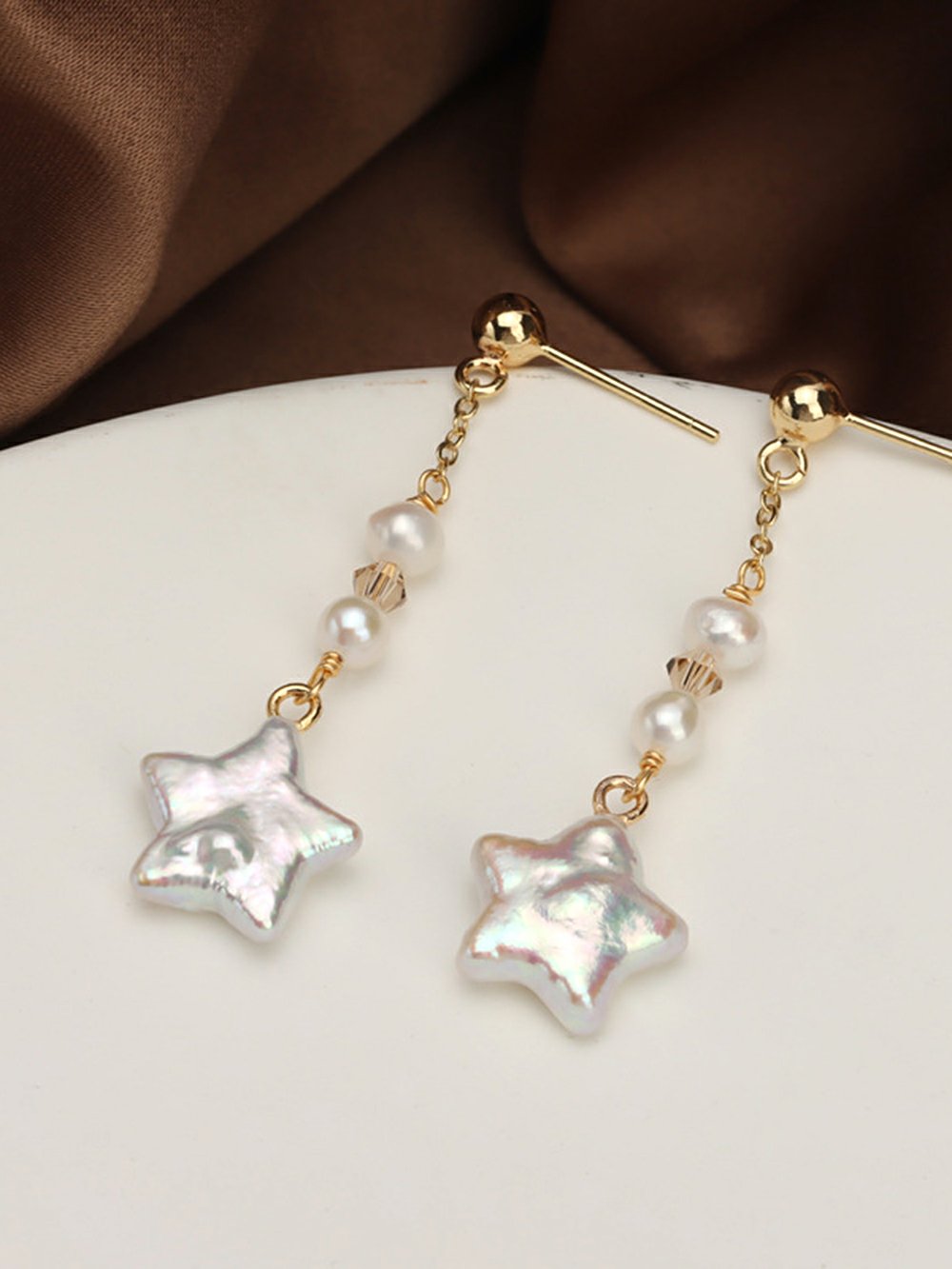 Kolczyki z pereł w kształcie barokowych gwiazd i frędzli