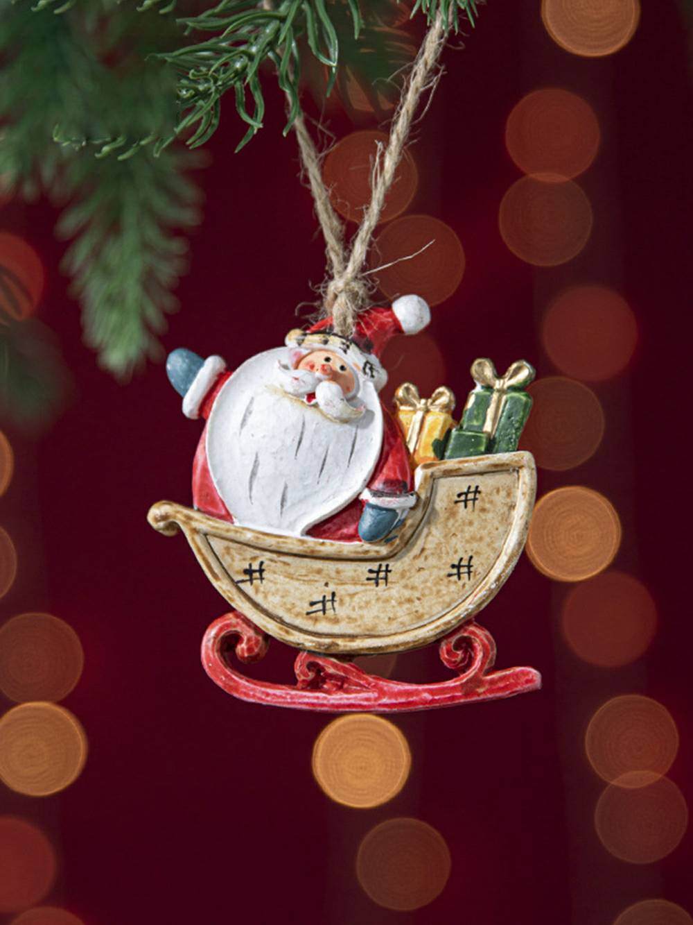 Ornamento fai da te con pupazzo di neve di Babbo Natale con slitta vintage in resina colorata