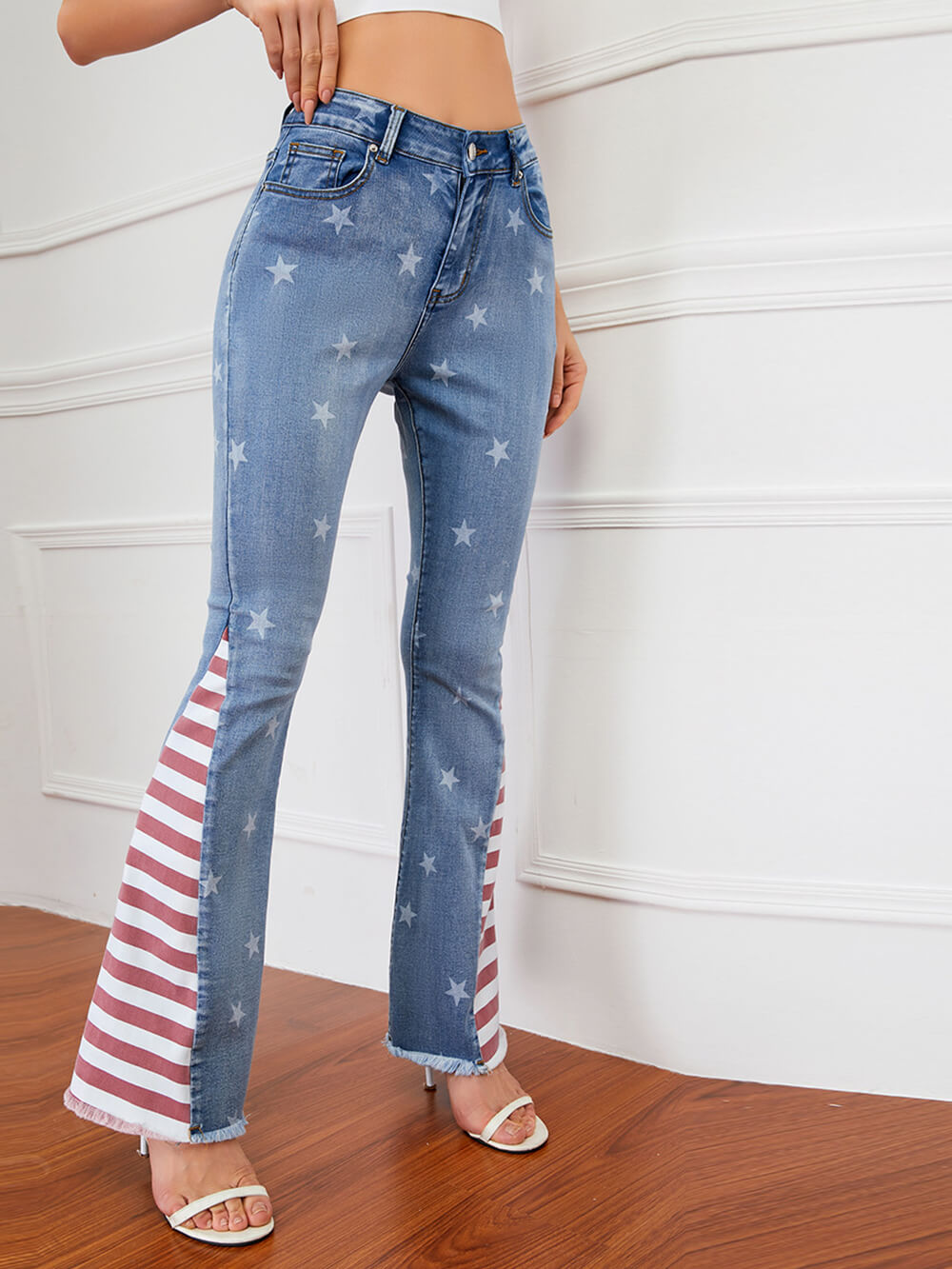 Jeans com listras colorblock estampadas com estrelas