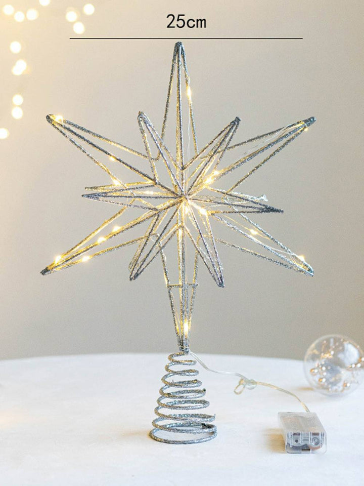 Beleuchtetes weihnachtliches dekoratives Kunstwerk mit Sternen
