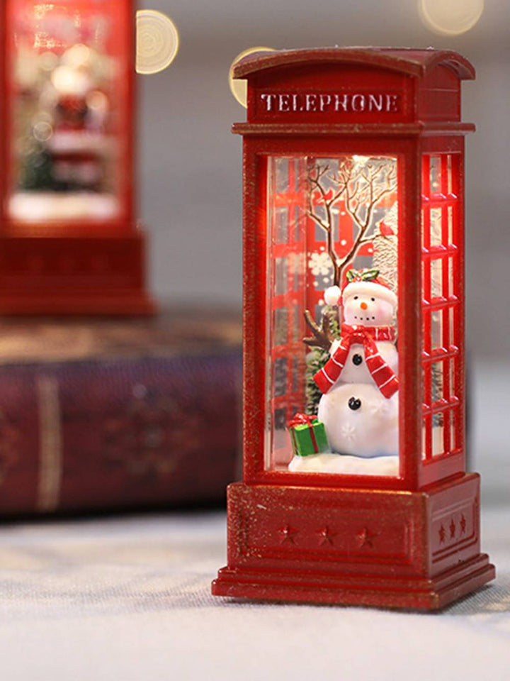Decorazione natalizia con fiamma per cabina telefonica, lampada a olio, pupazzo di neve