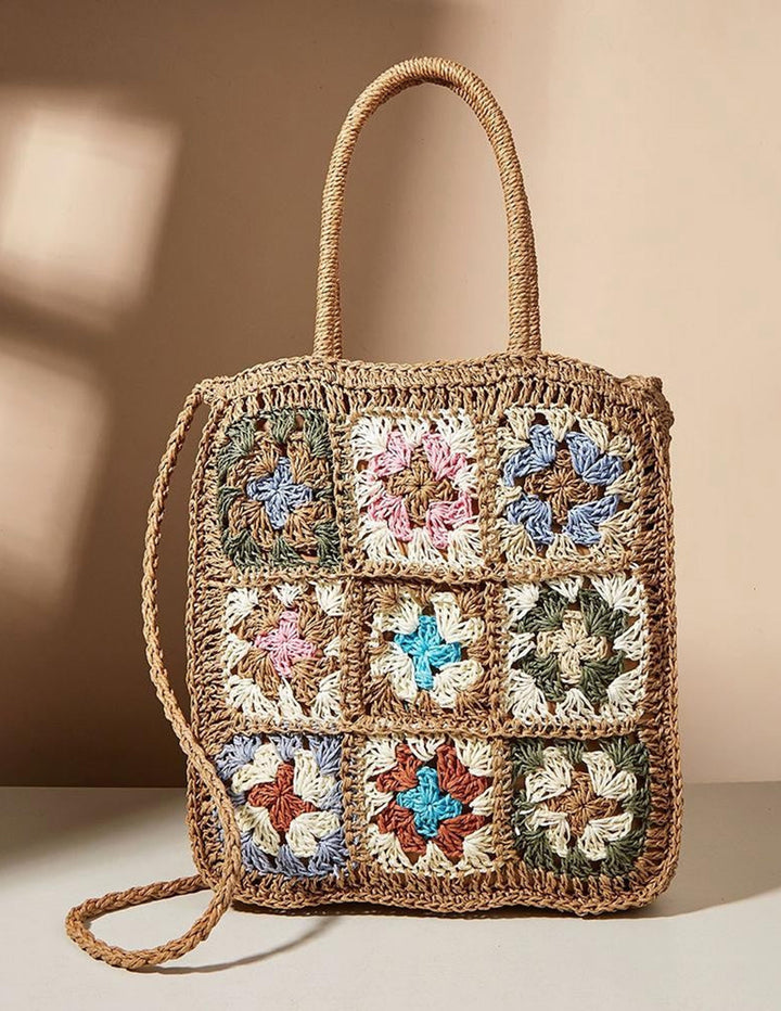 Bolsa de palha tecida com flores coloridas