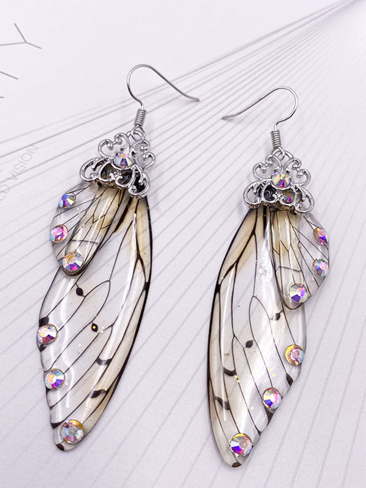 Kolczyki z kryształowymi skrzydłami motyla i szarymi kryształkami cykady