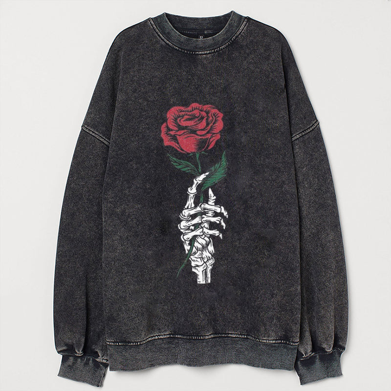 Vintage roos in skelethandsweater
