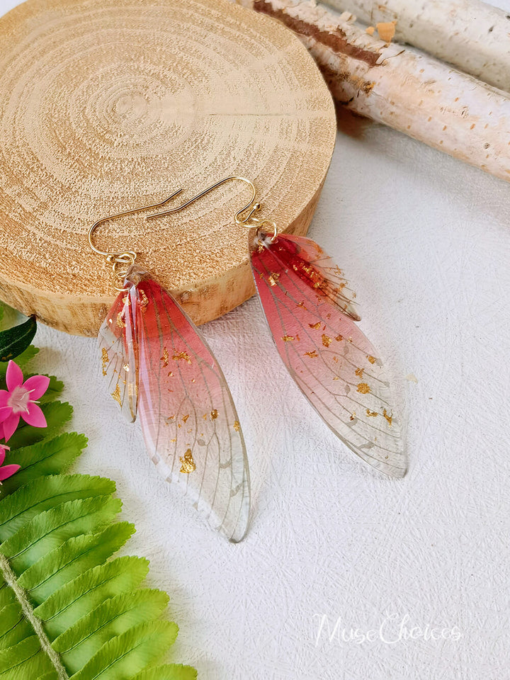 Boucle d'oreille en feuille d'or en cristal faite à la main avec aile de papillon