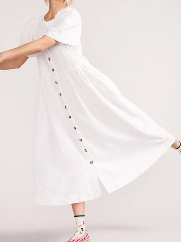 Lniana sukienka midi zapinana na guziki z dekoltem w szpic i kieszenią w kolorze białym