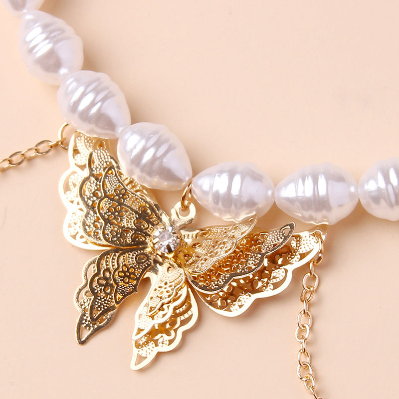 Collana con pendente a farfalla di perle