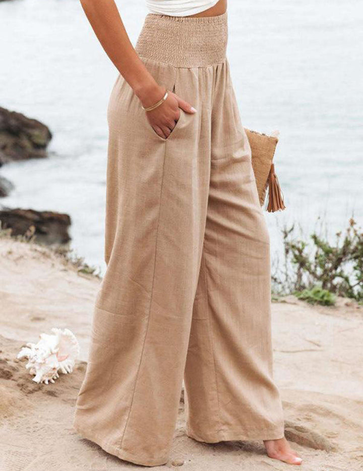 Pantalones de lino con pernera ancha y costura lateral con cintura fruncida