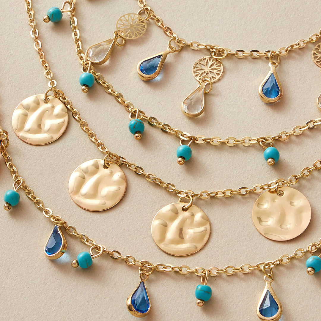 Quasten-Boho-Halskette – mehrschichtiges Set aus Goldscheibe und blauem Juwel